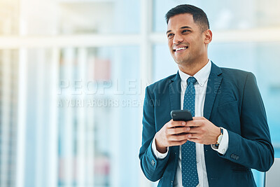 Buy stock photo Phone, thinking and mockup with a business man in his office, typing a text message for communication. Mobile, idea and networking with a happy young employee chatting online in a corporate workplace