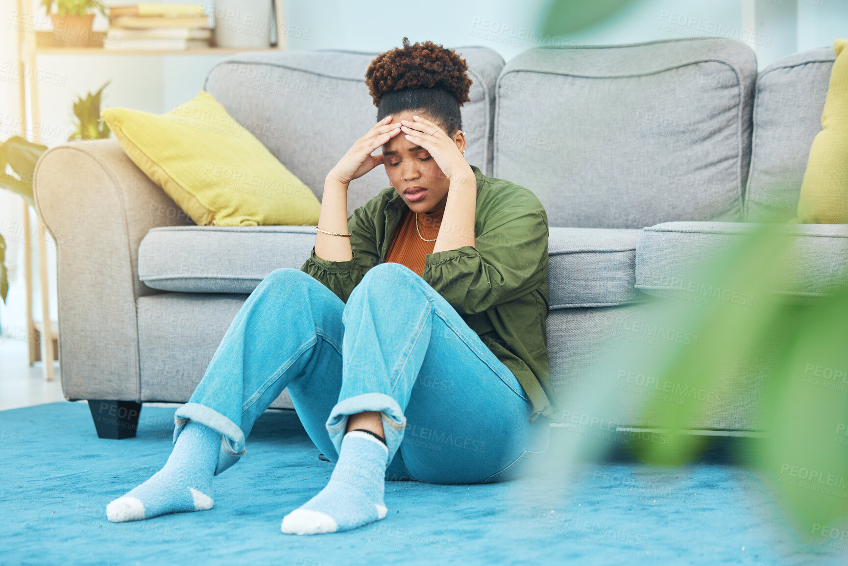 Buy stock photo Woman, home and headache, stress or sad for mortgage, rent or debt, financial mistake and crisis on floor. Young african person with depression, pain and fatigue for student loan in living room