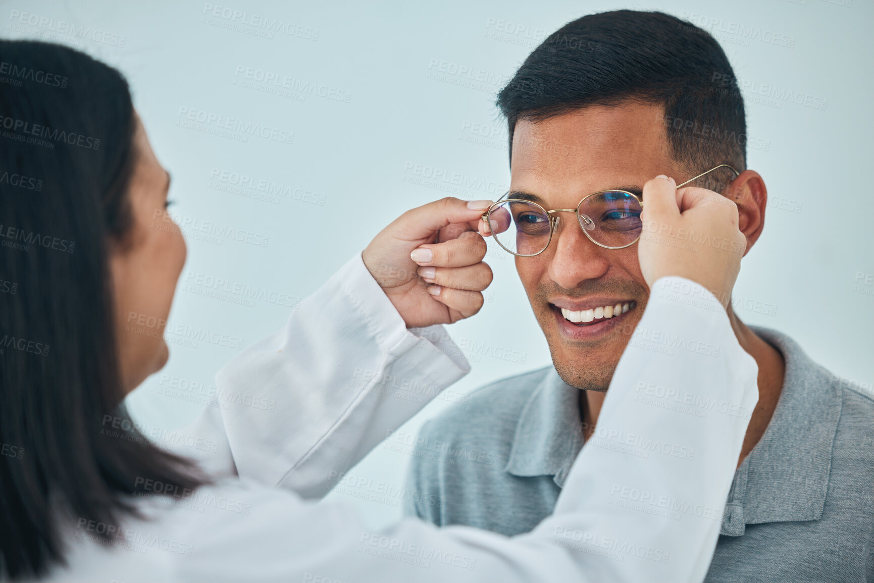 Buy stock photo Glasses, eye care and vision, optometrist and patient with help and eyewear choice, prescription and lens. Wire frame, smile and people at optometry clinic during consultation, healthcare and test