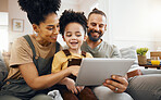 Family, tablet and parents with child relax on couch, bonding and happy streaming together at home. Smile, love and care with tech, gaming or movies with e learning and man with woman and boy kid