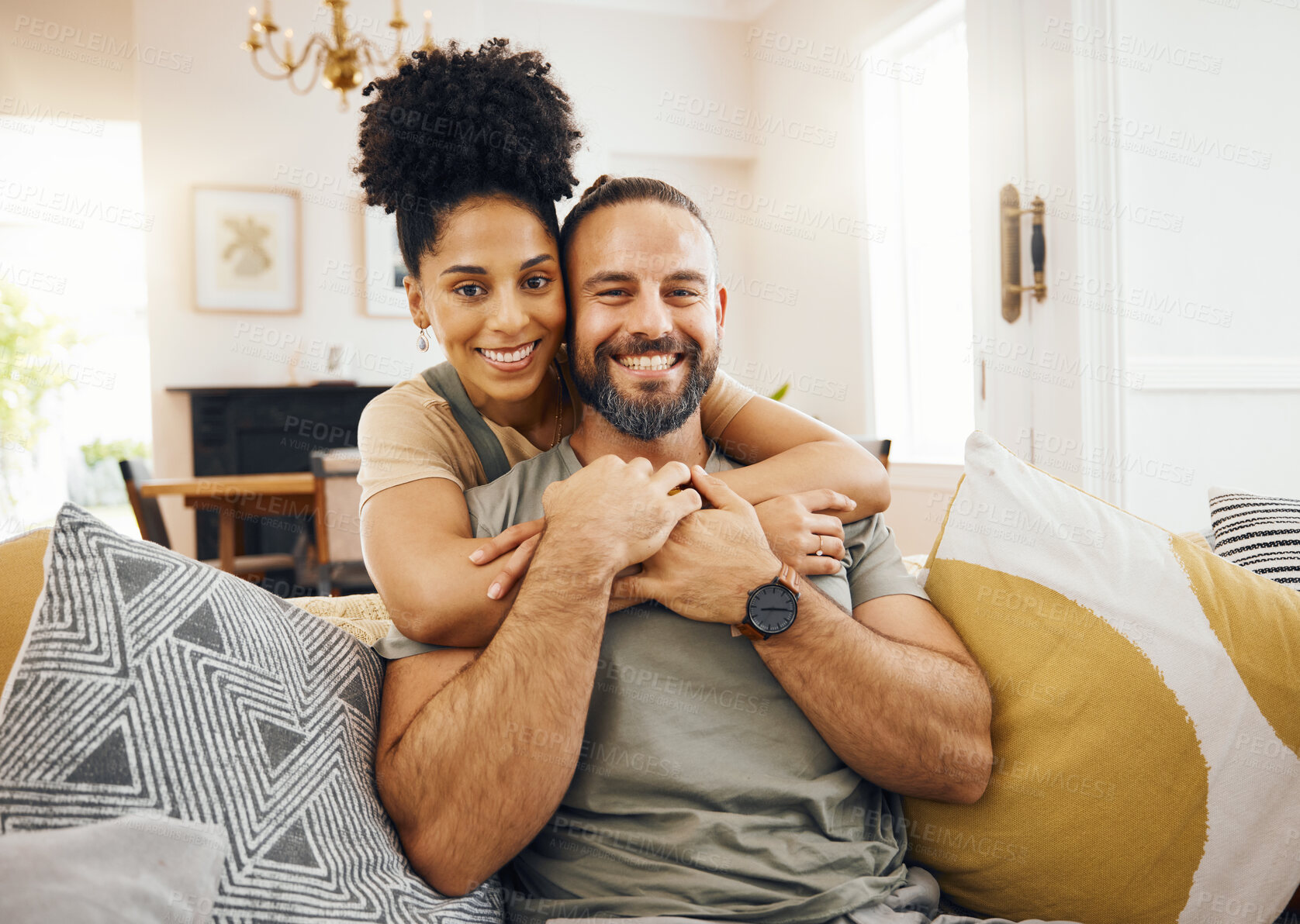 Buy stock photo Hug, portrait and couple with love, smile and marriage with care, commitment or relax in a living room. People, man or woman embrace, bonding or romance with relationship, home or loving together