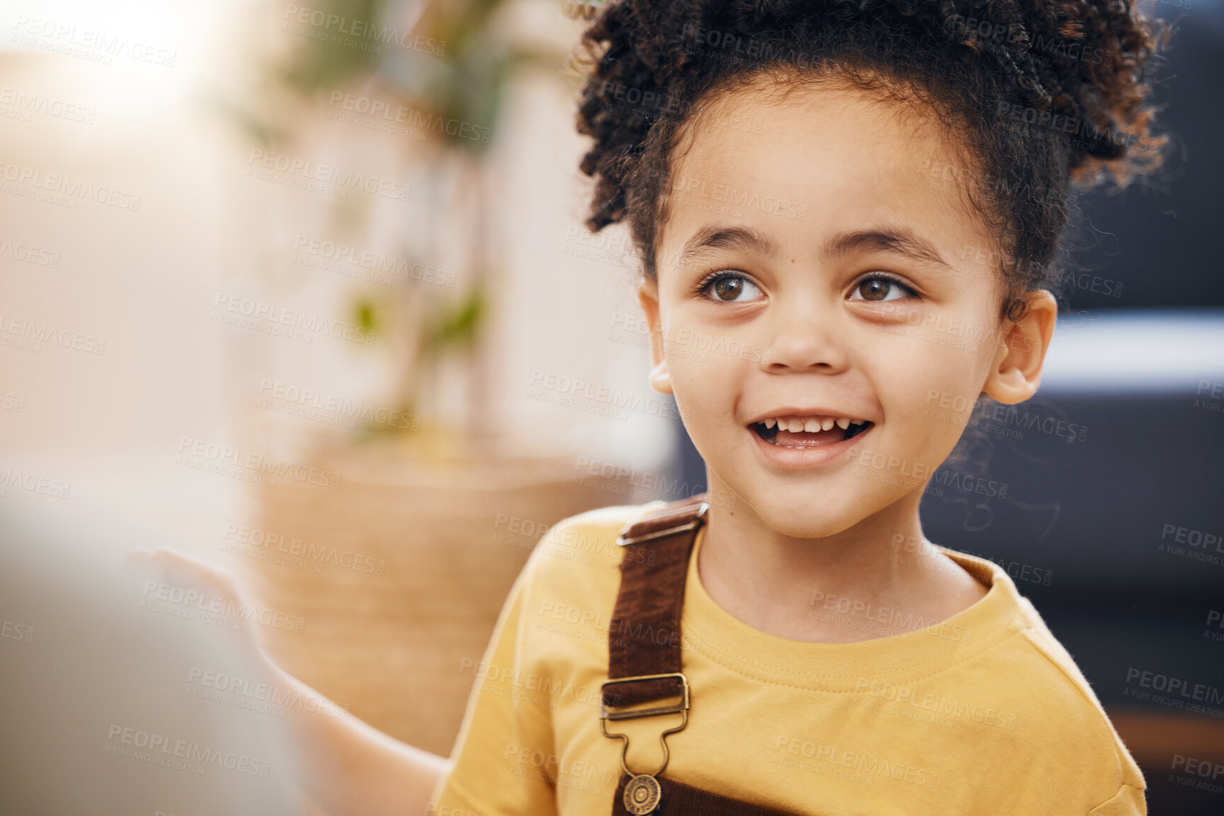 Buy stock photo Happy, face and young child with smile, relax and fun on weekend in living room of family home in Brazil. Lens flare, sweet kid and person in lounge of apartment with happiness and joy in the morning