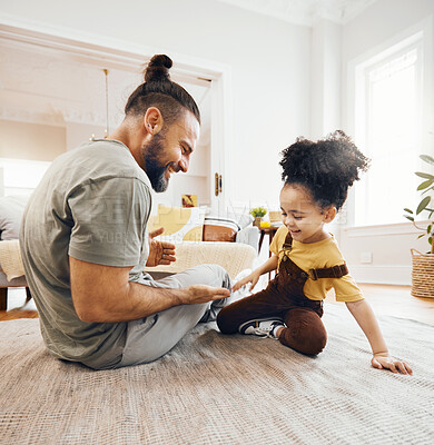 Buy stock photo Happy family, father and child with hand game on floor of living room for learning, love and development. Smile, person and kid on ground in lounge of apartment for relax, happiness and care 