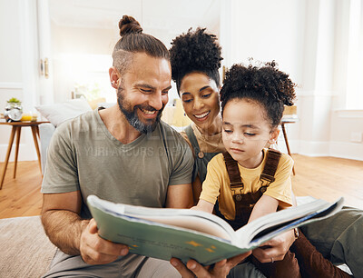 Buy stock photo Interracial parents, kid and reading with book, story and learning with care, love and teaching on floor. Father, mother and child with education, knowledge or language for development in family home