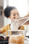 Whisk, egg and kitchen in closeup, kid and learning with muffins, cooking and helping hand from parents. Bowl, flour and child with development, teaching and baking with milk, cupcakes or family home