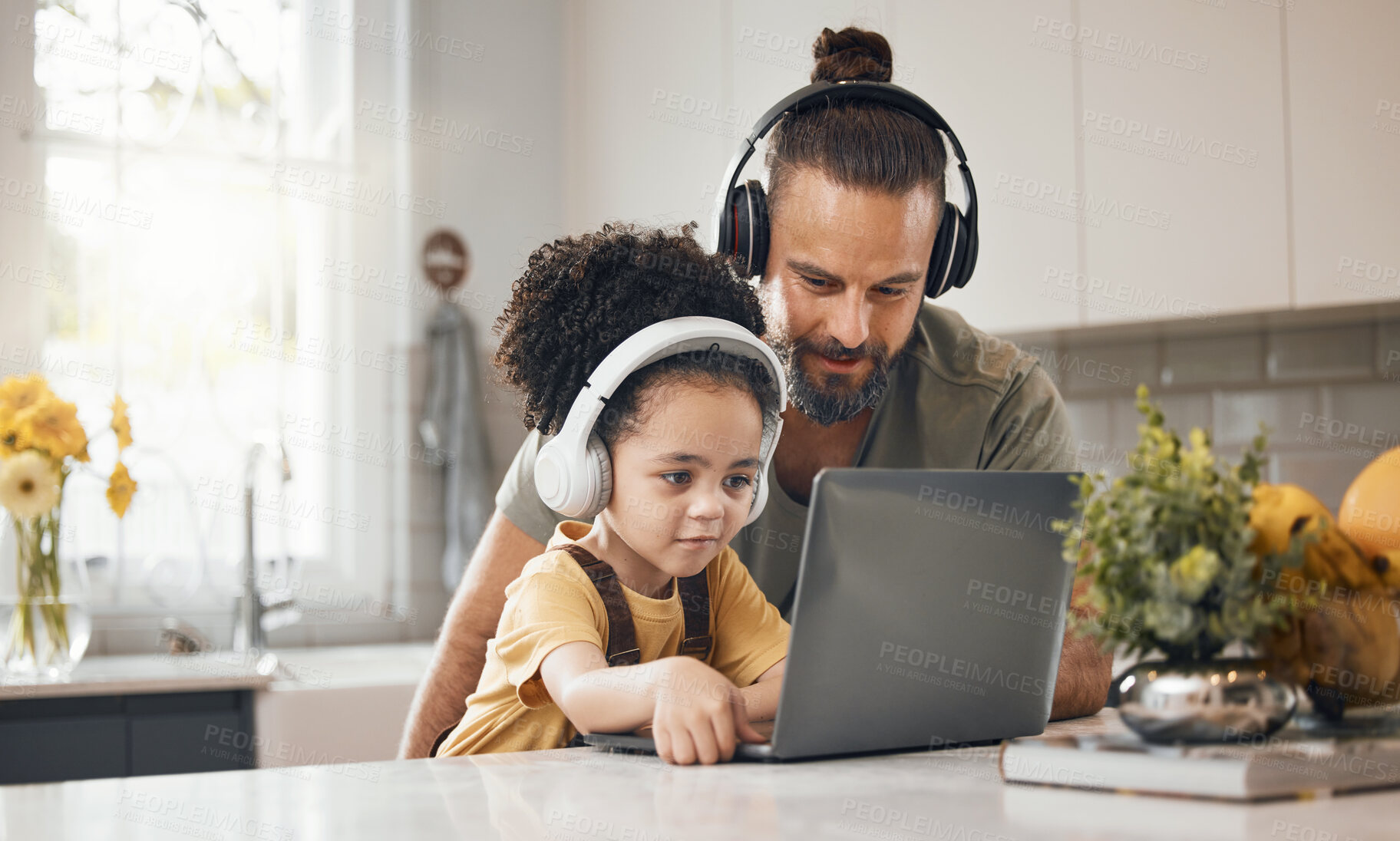 Buy stock photo Father, child and laptop with headphones, home or happy for movie, music or streaming subscription. Dad, kid and computer for education, learning or help for online course in interracial family house