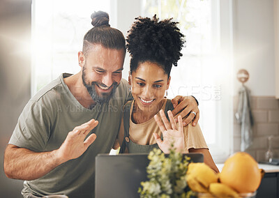 Buy stock photo Interracial couple, laptop and video call, happy together or  at home on communication, technology and people in kitchen. Love, care or trust on virtual chat with smile, wave and hello on internet pc