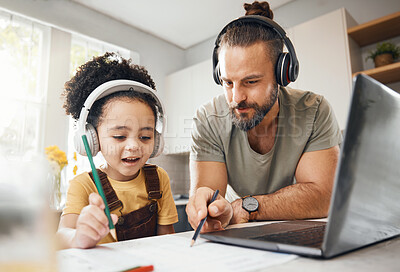 Buy stock photo Online education, dad and child in home with headphones, laptop and homework for virtual class. Computer, father and boy working together for elearning, help with writing and kid in kitchen with man.