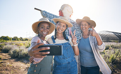 Buy stock photo Farmer, women peace sign and selfie in countryside with team and scarecrow outdoor with a smile. Diversity, worker group and happy with social media and profile picture on a agro farm and field