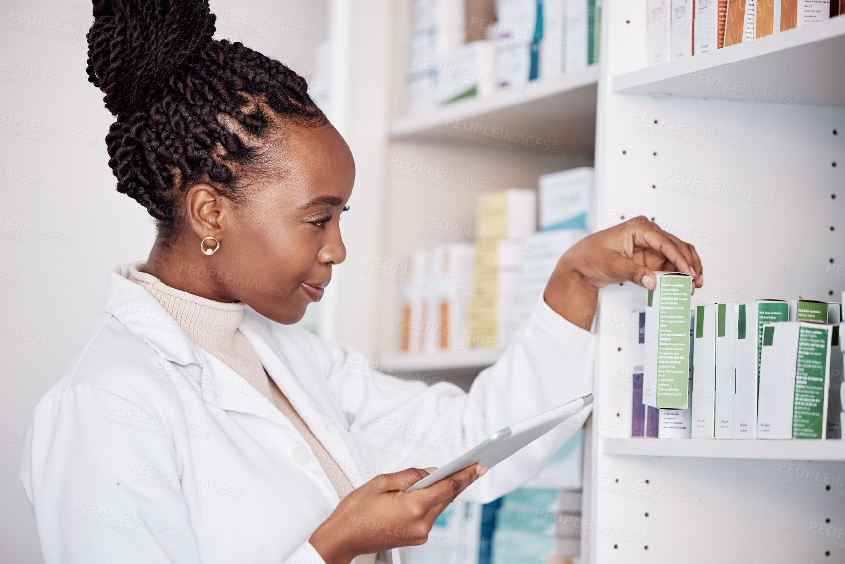 Buy stock photo Pharmacy, woman and digital tablet on medicine shelf, healthcare inventory and boxes or stock management. Medical pharmacist or african doctor for pills search, drugs package or e commerce technology