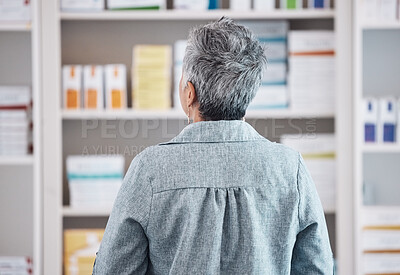 Buy stock photo Patient, pharmacy and checking pharmaceutical shelf for medication, healthcare or boxes at the drugstore. Rear view of customer in search for medical product, supplements or antibiotics at the clinic