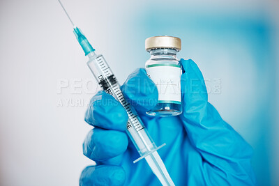 Buy stock photo Hand, vaccine and syringe with a doctor in the hospital closeup for healthcare or medication. Medical, injection and treatment with a medicine professional in a clinic for innovation or cure