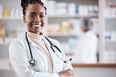 Black woman, doctor in portrait with arms crossed and healthcare, medical professional and hospital dispensary. Pharmacy, health and confidence, smile with wellness and drugs, medicine and service
