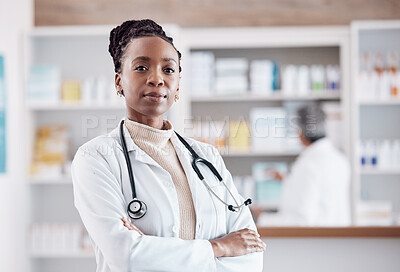 Buy stock photo Pharmacy, pharmacist or portrait of black woman with arms crossed in healthcare clinic or drugstore. Proud nurse, wellness or confident African doctor by medication or medicine on shelf ready to help