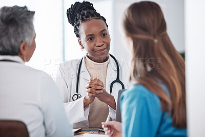 Buy stock photo Teamwork, doctors or black woman in meeting or discussion for hospital schedule or collaboration. Leadership, group or nurses talking or speaking of medical healthcare research, report or news update