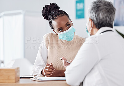 Buy stock photo Face mask, help or doctor consulting a patient in meeting in hospital writing history or healthcare record. People, medical or nurse with black woman talking or speaking of test results or advice 