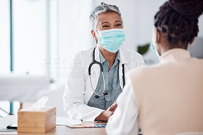 Buy stock photo Face mask, mature or doctor consulting a patient in meeting in hospital writing history or healthcare record. People, medical or happy nurse with woman talking or speaking of test results or advice 
