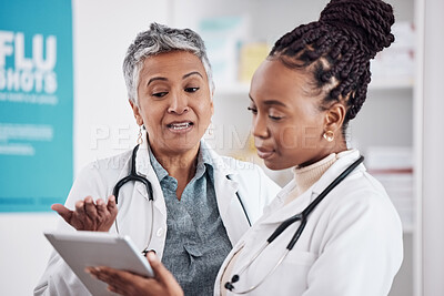 Buy stock photo Doctors, mentor and student with tablet and healthcare, women medical professional team and hospital dispensary. Pharmacy, health and digital schedule, collaboration and tech with drugs and medicine 