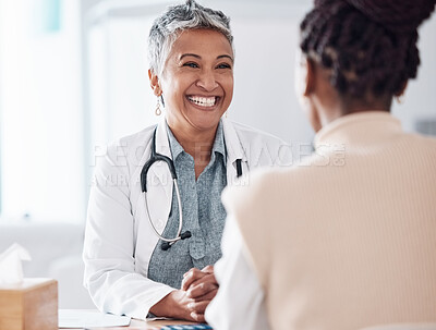 Happy woman, mature or doctor consulting a patient in hospital for healthcare help, feedback or support. People, medical or excited nurse with a person talking or speaking of test results or advice