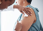 Medicine, healthcare and doctor with woman for vaccination in a clinic for medical treatment for prevention. Closeup of a nurse doing a vaccine injection with a needle syringe in a medicare hospital.