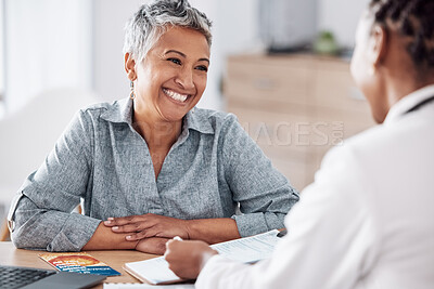 Buy stock photo Paperwork, doctor or consulting a happy patient in meeting talking in hospital for history or healthcare record. Smile, medical or nurse with mature woman speaking of test results, update or document