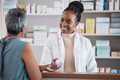 Buy stock photo Pharmacist, pharmacy woman and customer for medicine service, healthcare advice and clinic solution or support by counter. African doctor or medical people with box for pills, product or retail drugs