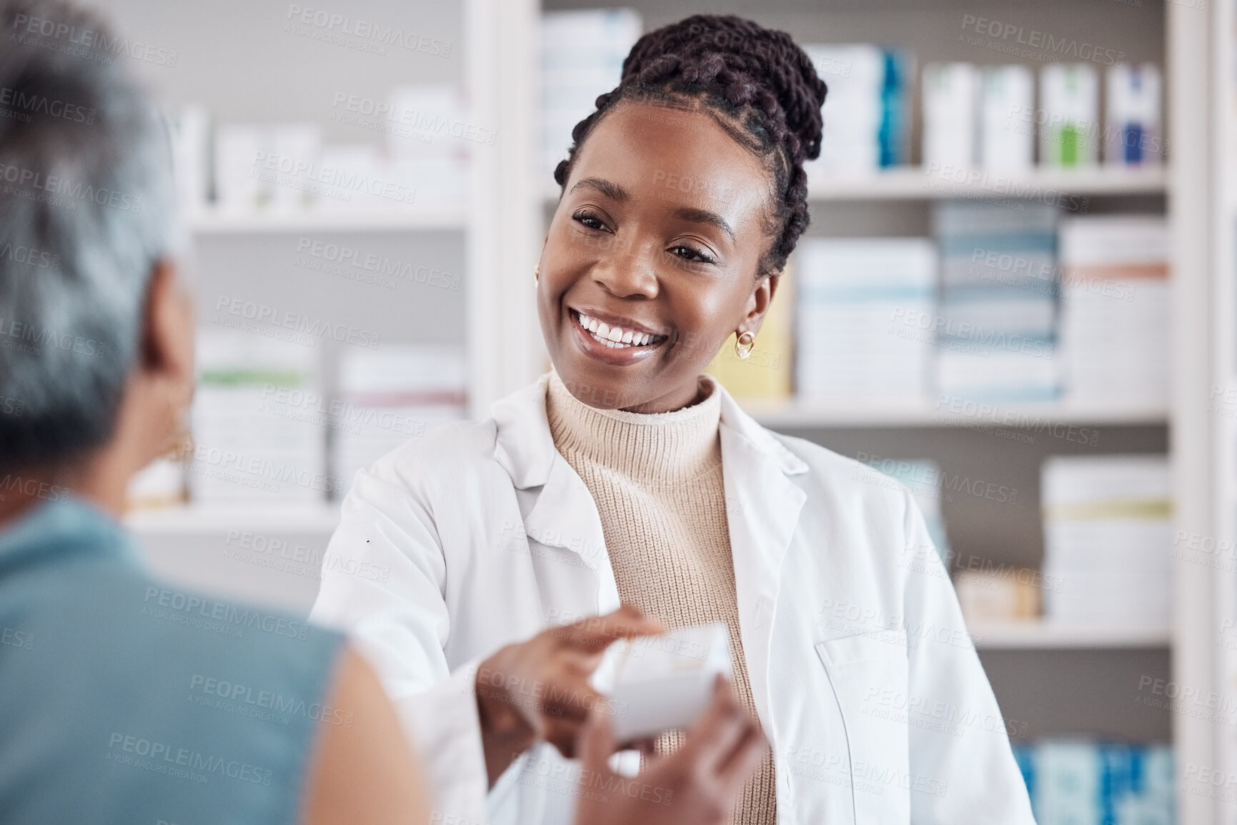 Buy stock photo Pharmacist, medicine or black woman with pills supplements for patient for wellness or help. Pharmacy, smile or doctor giving a mature woman medical product or medication box in retail healthcare