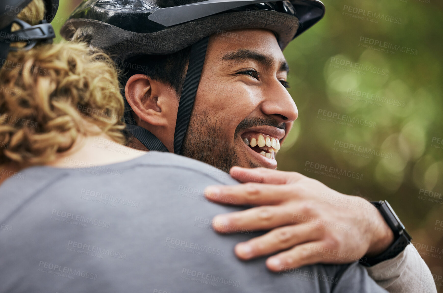 Buy stock photo Hug, smile and cycling with friends in nature for fitness, health and partnership. Teamwork, motivation and sports adventure with men training in forest for wellness, workout and freedom together