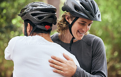 Buy stock photo Hug, teamwork and cycling with friends in nature for fitness, health and partnership. Happy, motivation and sports adventure with men training in forest for wellness, workout and freedom together