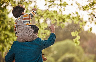 Buy stock photo Piggyback, relax and father with child in park for support, playful and games. Love, freedom and adventure with man carrying baby in nature for family, summer and vacation together with mockup space