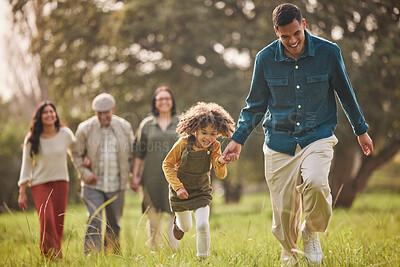 Buy stock photo Family, park and parents with children in nature for playing, bonding and running together in field. Happy grandparents, mother and father with girl relax outdoors on holiday, adventure and vacation