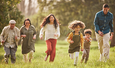Buy stock photo Family, park and parents running with children in nature for playing, bonding and fun together in field. Happy grandparents, mom and father with kids relax outdoors on holiday, freedom and vacation