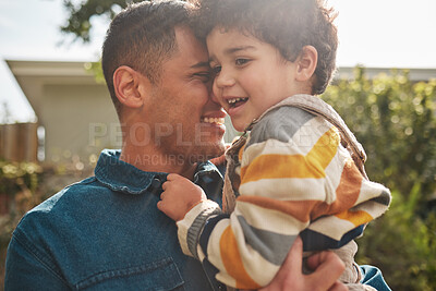 Buy stock photo Outdoor, father and boy with a smile, hug and sunshine with fun, playful and bonding in a backyard. Parent, kid and dad with child, garden and sunlight with freedom, weekend break and summer with joy