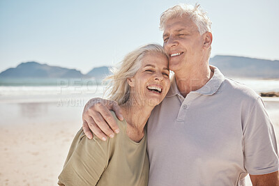 Buy stock photo Senior couple, hug and love at the beach with happiness, freedom and care on vacation. Man and woman laughing on retirement holiday, adventure and romantic trip outdoor in nature to relax and travel