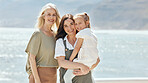 Beach, portrait and girl with her grandmother and mother on vacation, adventure or holiday. Happy, smile and family generations of women by the ocean for bonding on weekend trip together in Australia