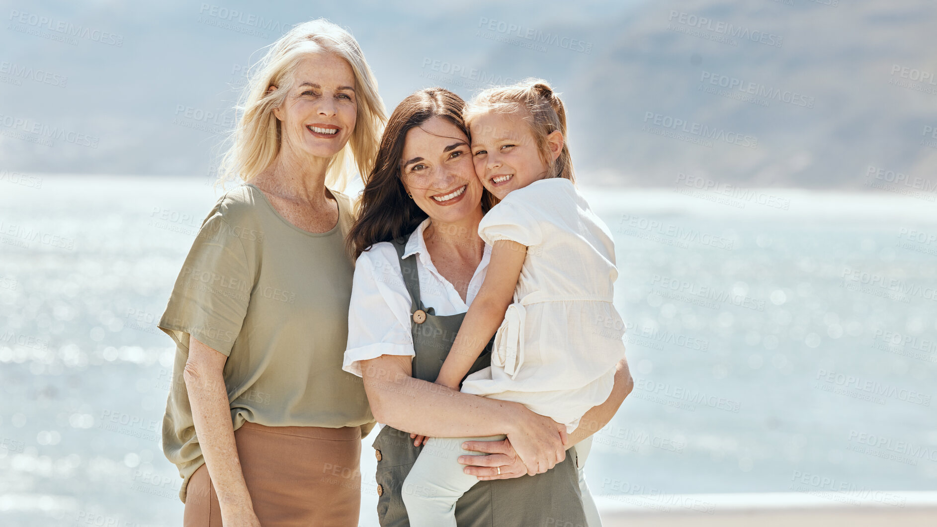 Buy stock photo Beach, portrait and girl with her grandmother and mother on vacation, adventure or holiday. Happy, smile and family generations of women by the ocean for bonding on weekend trip together in Australia