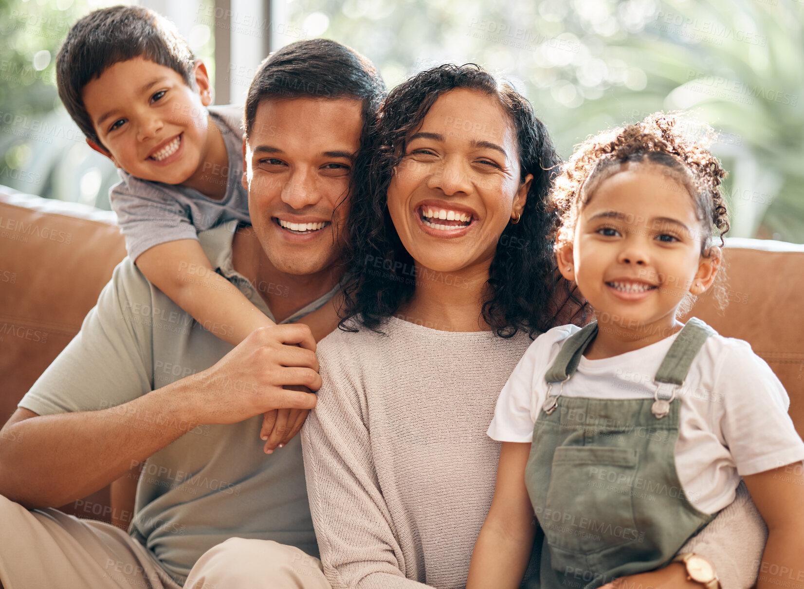 Buy stock photo Happy family, portrait and bonding on holiday, weekend or summer break in relax on living room sofa at home. Mother, father and children smile in happiness, love or care for day off at the house