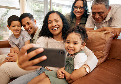 Buy stock photo Big family, selfie and grandparents with children on sofa for holiday, love and relax together at home. Interracial people, mother and father with kids smile on couch for profile picture photography