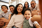 Family, selfie portrait and grandparents and children on sofa for happy holiday, love and relax together at home. Interracial people, mother and father with kids in profile picture or photography
