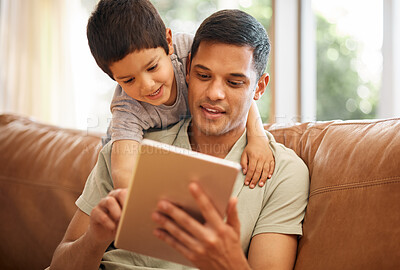 Buy stock photo Father, boy and child with tablet on sofa for online games, reading ebook story and elearning multimedia. Man, dad and happy kid streaming cartoon, movies or digital technology in living room at home