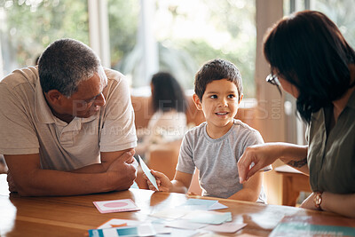 Buy stock photo Home school, learning and parents support child with lesson and flash cards for education. Studying, kid and grandfather with teaching, communication and bonding from development and conversation