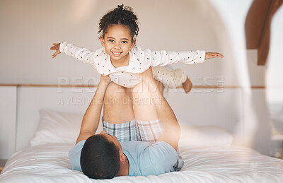 Buy stock photo Kid, father and airplane games on bed for support or relax at home for crazy fun. Portrait, dad and happy girl child excited to fly in bedroom for freedom, fantasy and balance of play, care or energy