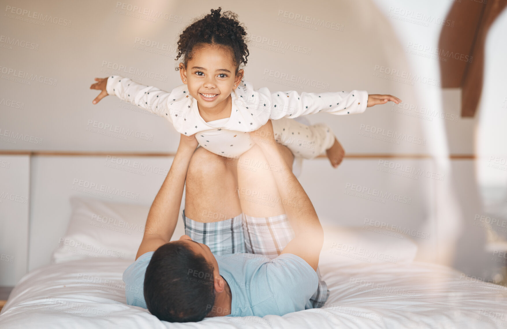 Buy stock photo Kid, father and airplane games on bed for support or relax at home for crazy fun. Portrait, dad and happy girl child excited to fly in bedroom for freedom, fantasy and balance of play, care or energy