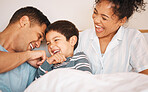 Happy, tickle and smile with family in bedroom for playful, morning and love. Care, support and wake up with parents and child laughing in bed at home for weekend, positive and resting together