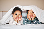 Siblings, happy and portrait of children in bed in blanket for bonding, love and fun at home. Family, childhood and young boy and girl in bedroom for relaxing, resting and laying together in morning