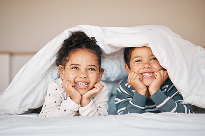 Buy stock photo Siblings, happy and portrait of children in bed in blanket for bonding, love and fun at home. Family, childhood and face of boy and girl in bedroom for relax, resting and smile together in morning