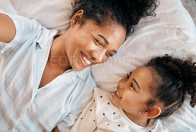 Buy stock photo Selfie, top view and mother with girl child on a bed happy, bond and relax at home. Love, profile picture and kid with mom influencer smile for social media, blog or podcast post or bedroom memory