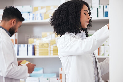 Buy stock photo Healthcare team, pharmacy and medicine on shelf for pills, tablets or medication inspection or inventory. Pharmacist woman or medical staff check stock or pharmaceutical product at drugstore or work