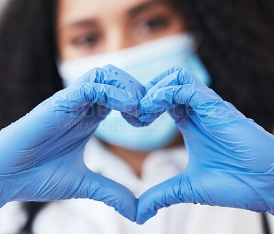 Buy stock photo Healthcare, hands and doctor with emoji heart at a hospital for support, hope or thank you for organ or blood donation. Zoom, love and female nurse with finger frame for gratitude in medical research