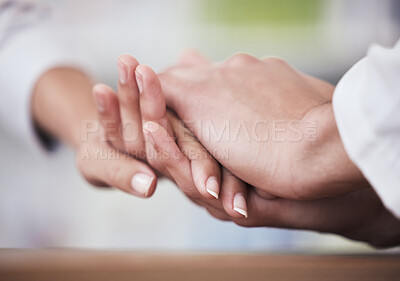 Buy stock photo Clinic consultation, pharmacist holding hands or person support client with healthcare crisis, clinic care or medical problem. Gratitude, pharmacy trust and empathy of closeup nurse helping patient